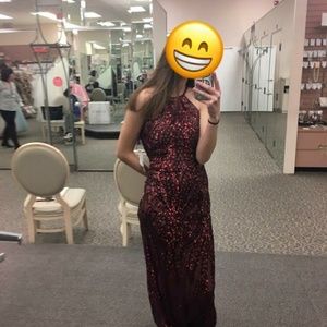 2 beautiful prom dresses worn once selling to put